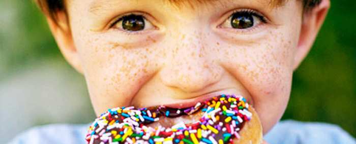La genética y la preferencia los niños por comida poco saludable